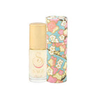 Perfume bottle with floral packaging on a white background